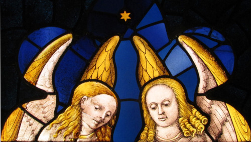 Two angels in stained glass windows